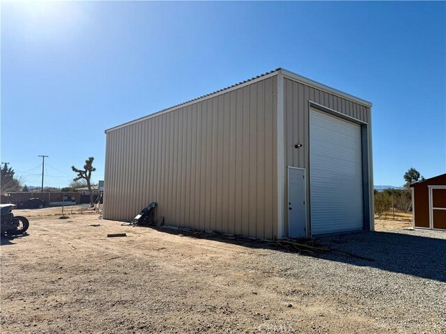 view of outdoor structure featuring a garage