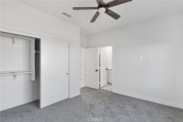 unfurnished bedroom with ceiling fan, a closet, and light colored carpet