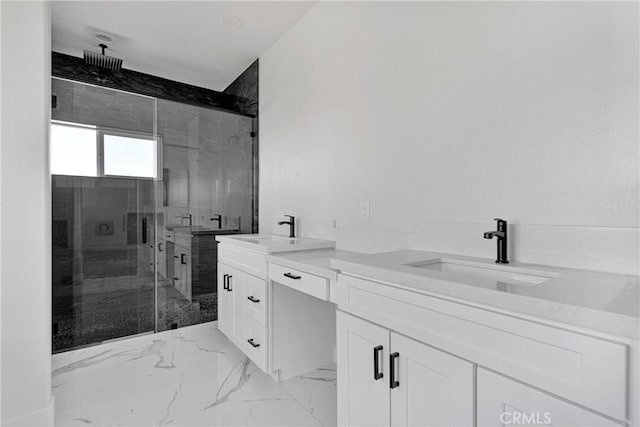 bathroom with a shower with door and vanity