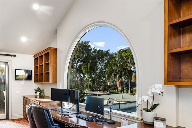 home office featuring vaulted ceiling