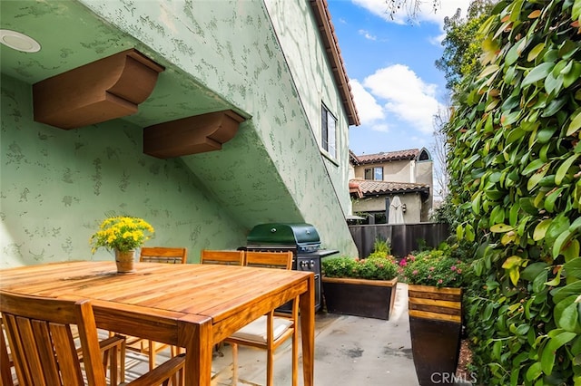 view of patio / terrace featuring a grill