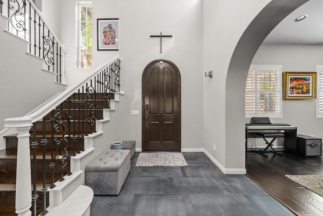 foyer entrance with hardwood / wood-style floors