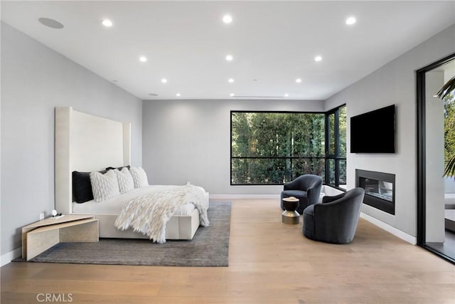 bedroom featuring light hardwood / wood-style floors