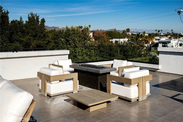 view of patio / terrace with a fire pit