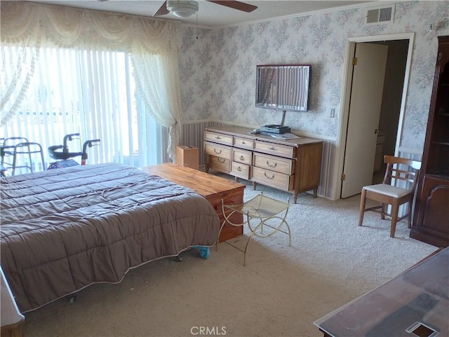 bedroom with ceiling fan and light colored carpet