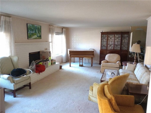 carpeted living room featuring a fireplace