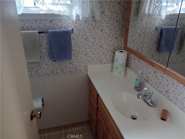 bathroom with vanity and tile patterned flooring