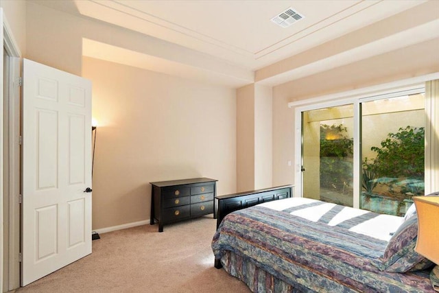 bedroom featuring access to outside and light carpet