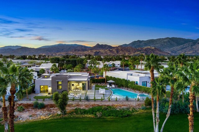 view of pool with a mountain view