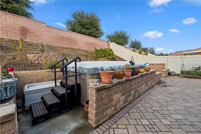 view of patio featuring a fenced backyard