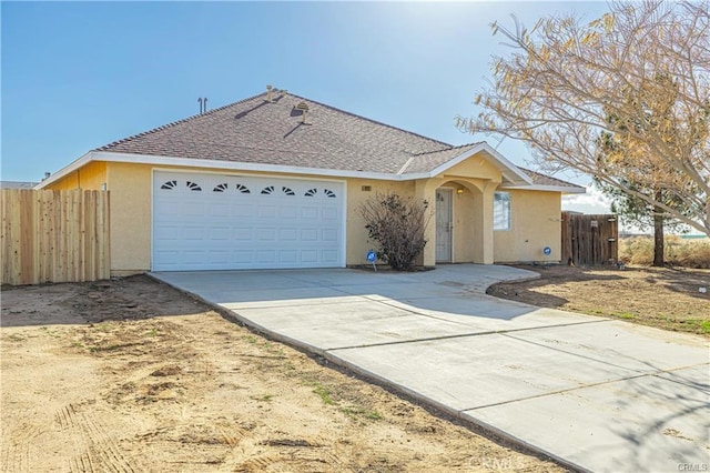 ranch-style home with a garage