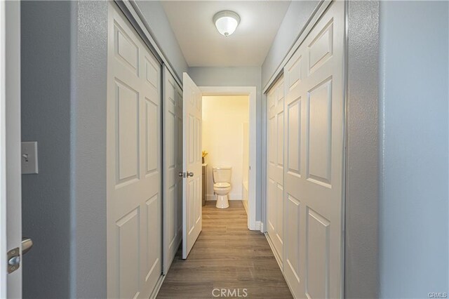 corridor featuring hardwood / wood-style flooring