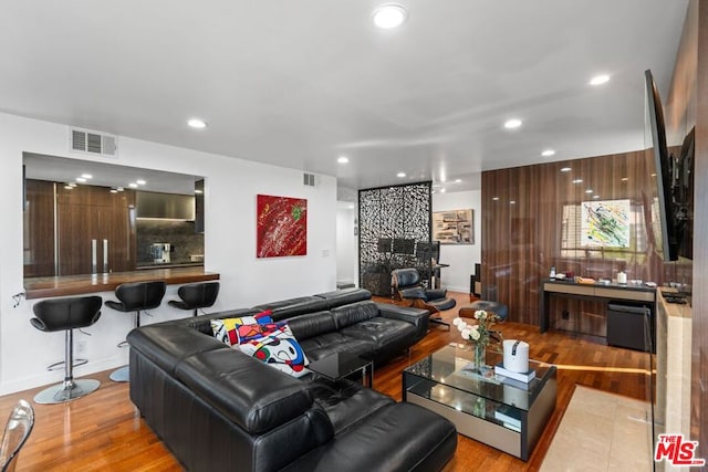 living room with light hardwood / wood-style floors