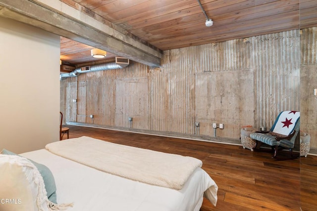 bedroom featuring wooden walls, wooden ceiling, and wood-type flooring