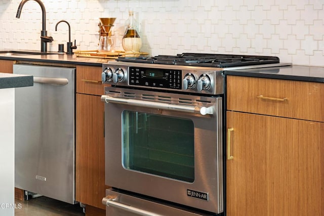 kitchen featuring backsplash, sink, and stainless steel appliances