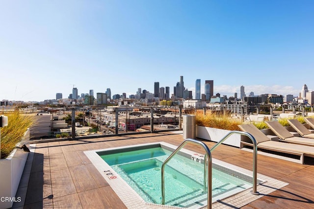 view of pool featuring a community hot tub