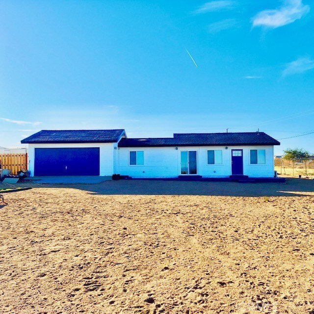 ranch-style home with a garage