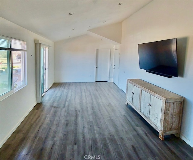 56133 Jesse Rd, Landers, CA 92285 - unfurnished living room with dark wood-style floors, baseboards, and vaulted ceiling