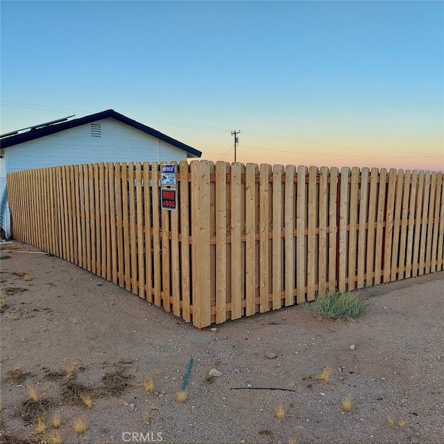 56133 Jesse Rd, Landers, CA 92285 - gate at dusk featuring fence