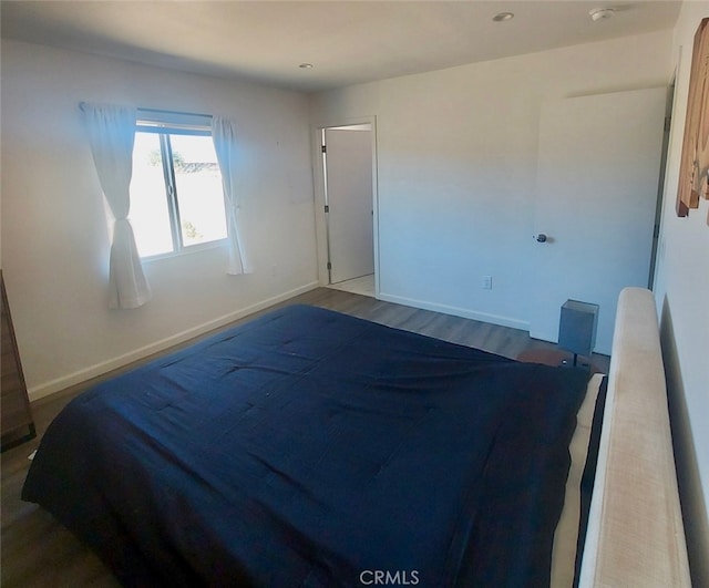 bedroom featuring hardwood / wood-style flooring