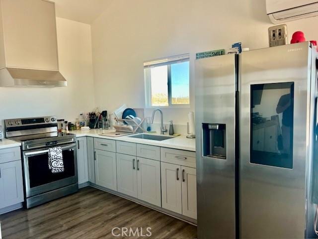 56133 Jesse Rd, Landers, CA 92285 - kitchen with a sink, appliances with stainless steel finishes, wall chimney range hood, and light countertops