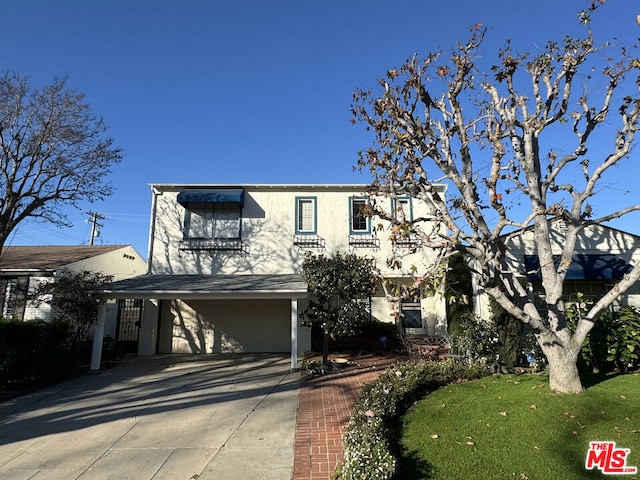 view of front of property with a garage