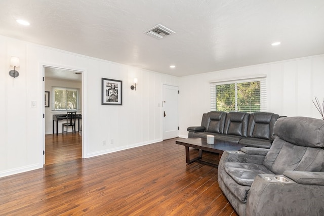 living room with dark hardwood / wood-style floors