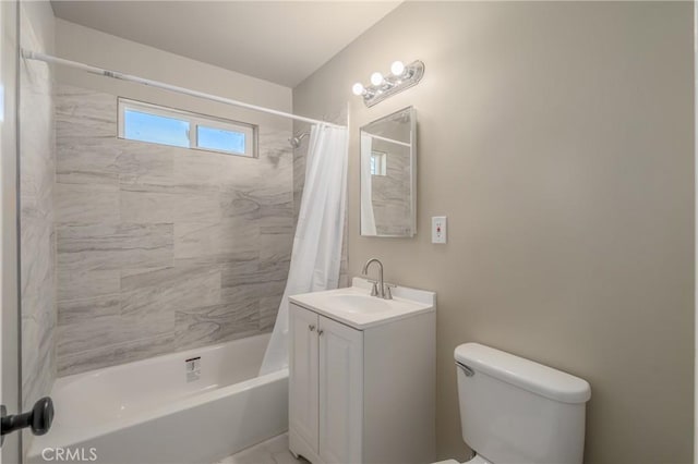 full bathroom with toilet, vanity, and shower / tub combo with curtain