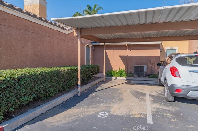 view of parking featuring a carport