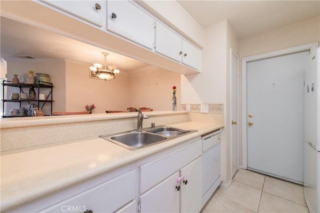 kitchen featuring white appliances, light tile patterned flooring, pendant lighting, white cabinets, and sink