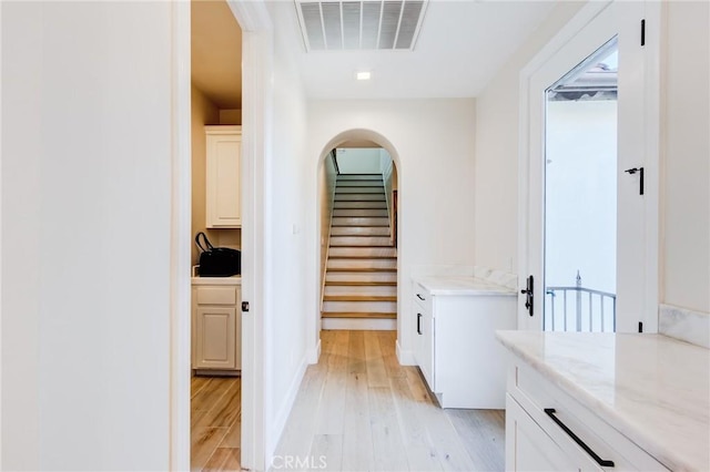 bathroom with hardwood / wood-style floors