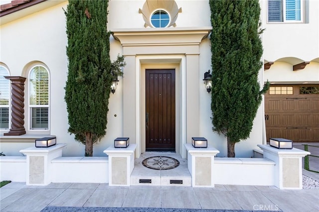 entrance to property featuring a garage