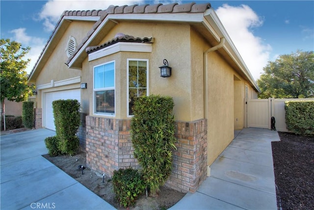 view of home's exterior with a garage