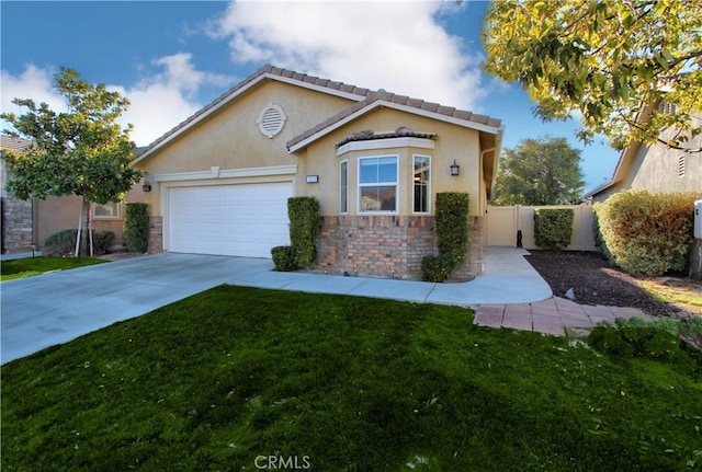 view of front of house with a garage and a front yard