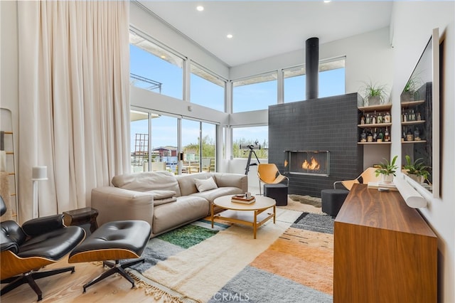 sunroom / solarium with a brick fireplace