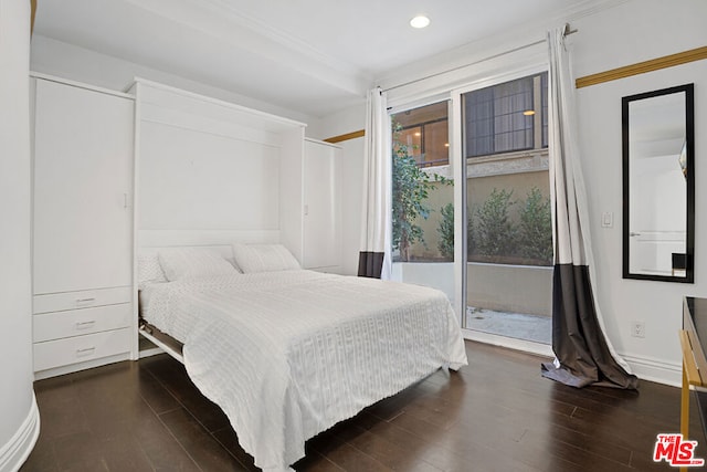 bedroom featuring access to outside and dark hardwood / wood-style floors