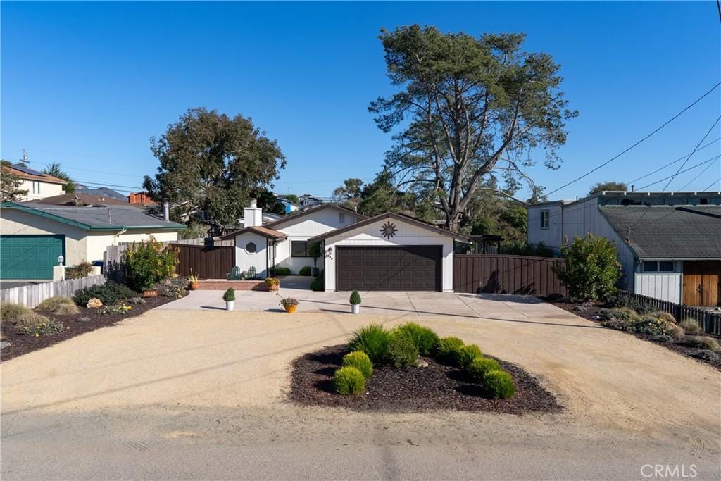 view of front of property with a garage