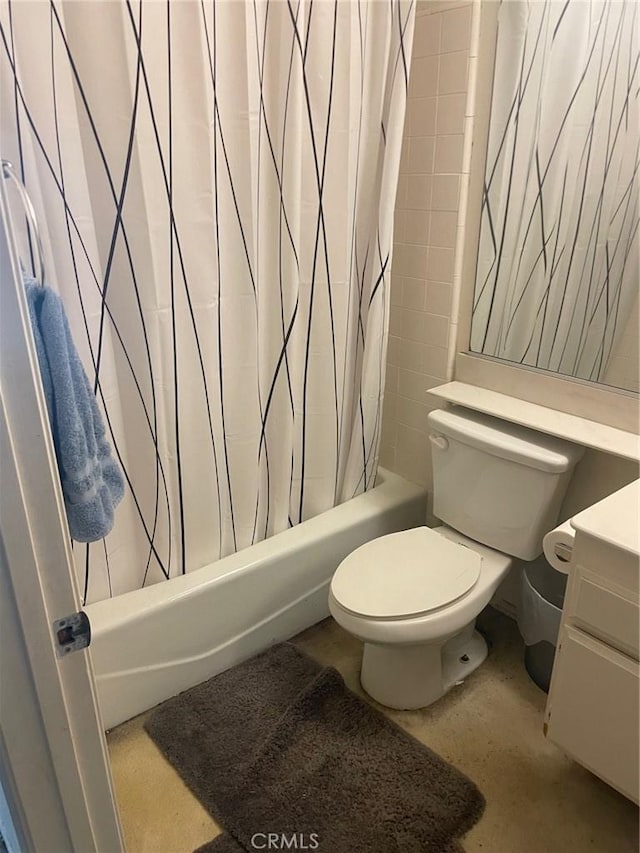 full bathroom featuring toilet, vanity, and shower / bathtub combination with curtain