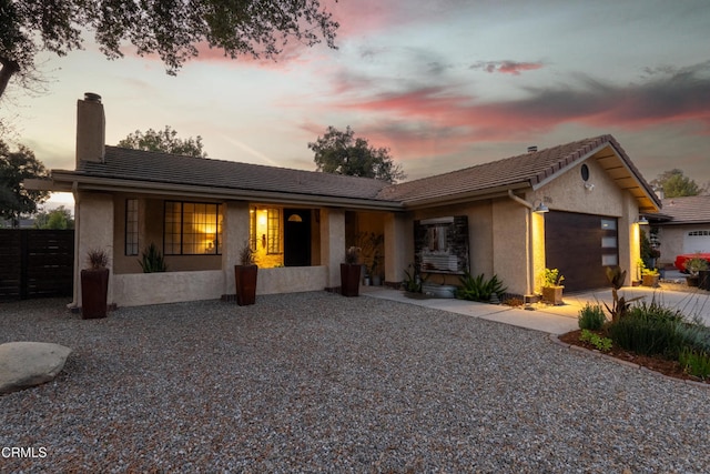 single story home with a garage