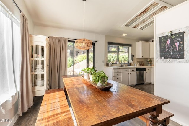 dining room featuring dark wood-style floors