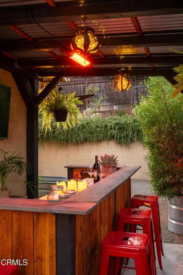 view of patio / terrace featuring outdoor dry bar