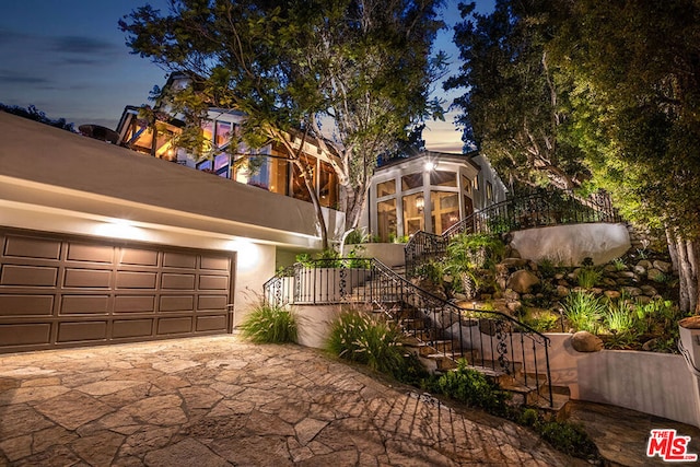 view of front of property featuring a garage