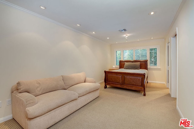 bedroom featuring ornamental molding and light carpet