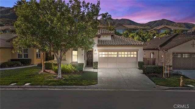 mediterranean / spanish-style home with a mountain view