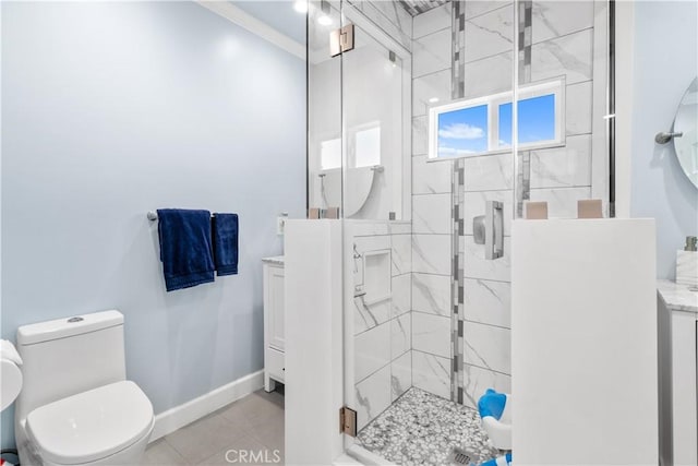 bathroom with toilet, vanity, tile patterned flooring, crown molding, and a shower with door