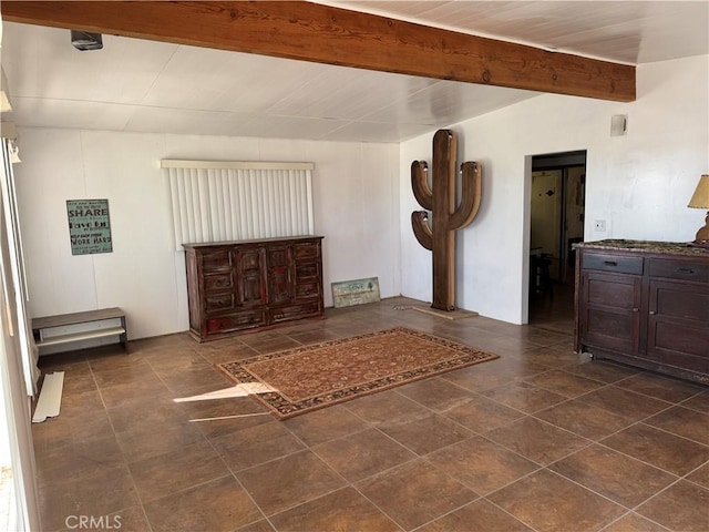 entrance foyer with beam ceiling