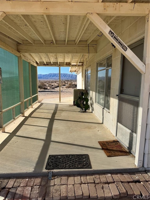 view of patio with a mountain view