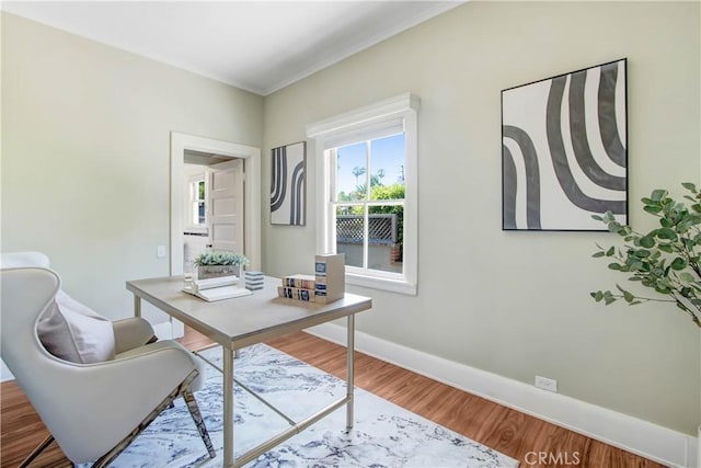 office area with hardwood / wood-style floors