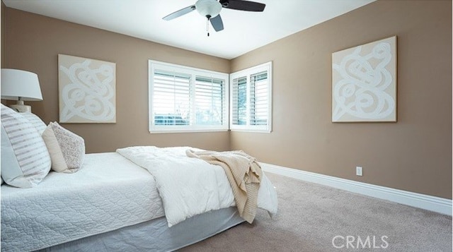 bedroom with carpet floors and ceiling fan