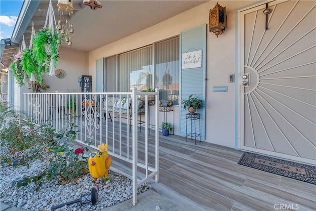 entrance to property with a porch